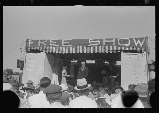 Untitled photo, possibly related to: Ashville, Ohio. Sideshows at the Fourth of July celebration