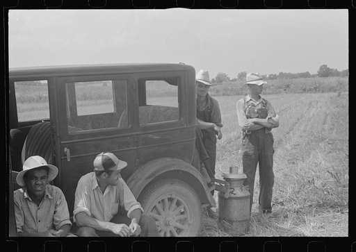 Untitled photo, possibly related to: Members of threshing crew, central Ohio