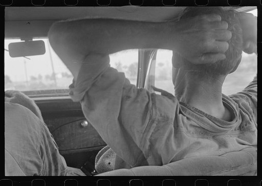 Ohio farmer resting in car, central Ohio