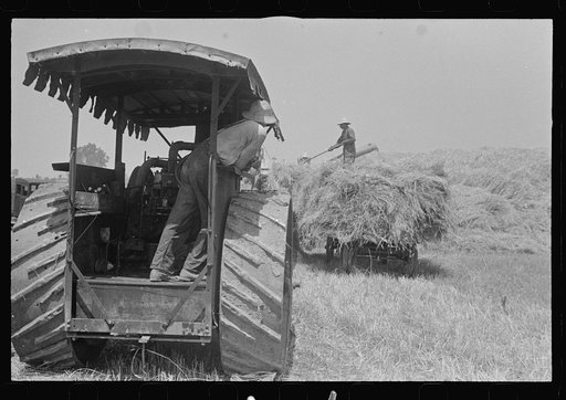 Untitled photo, possibly related to: Members of threshing crew, central Ohio