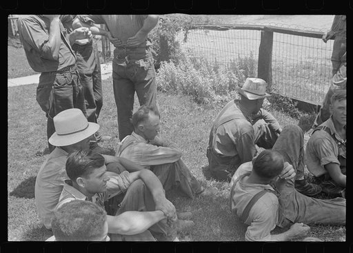 Untitled photo, possibly related to: Part of threshing crew, waiting for "second table," central Ohio