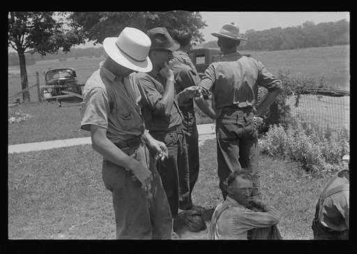Untitled photo, possibly related to: Part of threshing crew, waiting for "second table," central Ohio