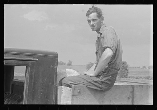 Harvest hand and helper on the Virgil Thaxton farm near Mechanicsburg, Ohio