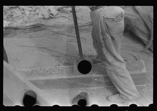 Untitled photo, possibly related to: Hightstown, New Jersey. Steps in the preparation of mortar for fresco painting in the Jersey Homesteads school