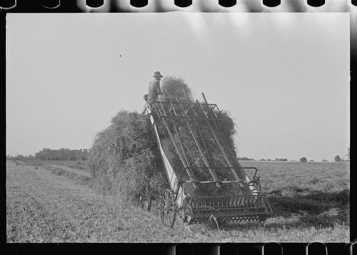 Loading hay from window with hayloader, central Ohio