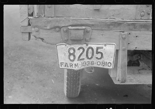 On Route 40, central Ohio moving combine and tractor (see general caption)
