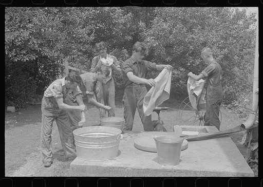 Washing up before dinner during wheat harvest, Central Ohio