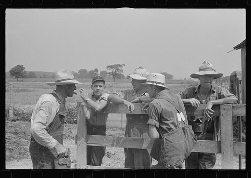 Untitled photo, possibly related to: Members of threshing crew, central Ohio