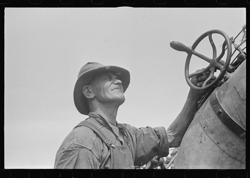 Member of threshing crew, central Ohio