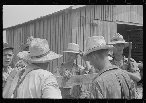 Untitled photo, possibly related to: Members of threshing crew, central Ohio