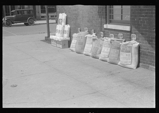 Untitled photo, possibly related to: Stock feed in front of feed store, Route 40, central Ohio