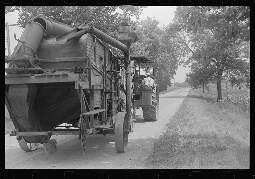Untitled photo, possibly related to: Steam thresher. These machines move from job to job under their own power, central Ohio