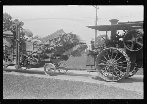 Untitled photo, possibly related to: Steam thresher. These machines move from job to job under their own power, central Ohio