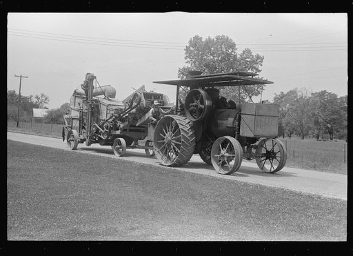 Untitled photo, possibly related to: Steam thresher. These machines move from job to job under their own power, central Ohio