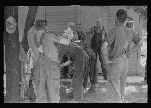 Untitled photo, possibly related to: Waiting around before dinner during wheat harvest, central Ohio