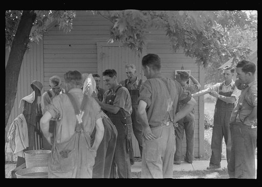 Untitled photo, possibly related to: Waiting around before dinner during wheat harvest, central Ohio