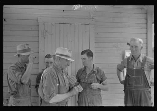 Untitled photo, possibly related to: Waiting around before dinner during wheat harvest, central Ohio