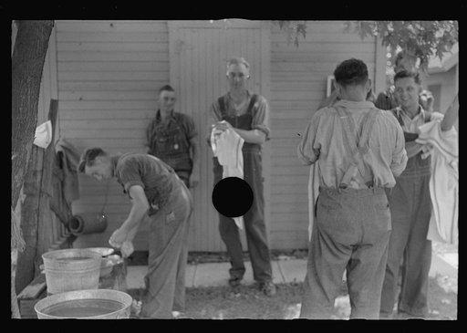 Untitled photo, possibly related to: Waiting around before dinner during wheat harvest, central Ohio