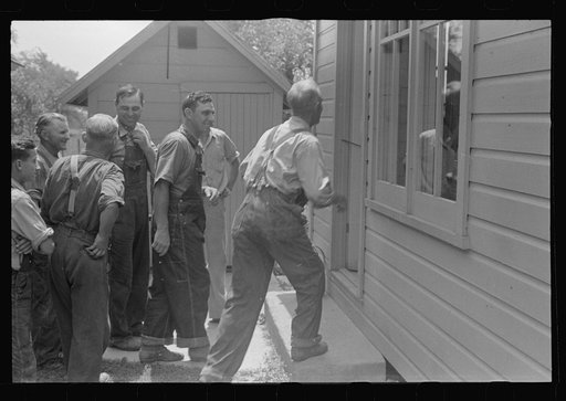 Field hands entering house for dinner during harvest time, central Ohio