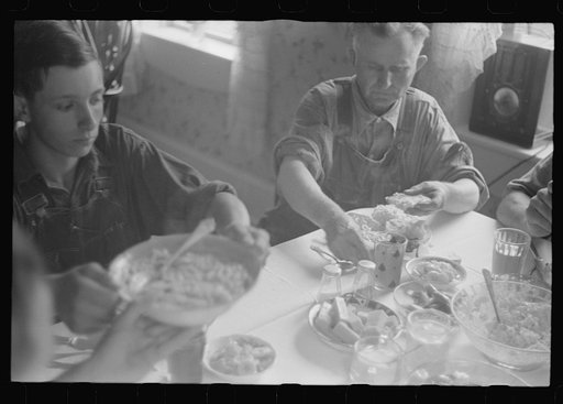 Untitled photo, possibly related to: Dinner time during wheat harvest, central Ohio