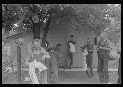 Untitled photo, possibly related to: Washing up for dinner during wheat harvest, central Ohio