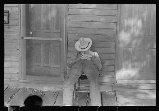 Circleville, Ohio's "Hooverville" (see general caption). Begins to talk: "No man in the United States had the trouble I had since 1931. No man. Don't talk to me. I'm deaf. I lost my farm in 1931. I went to work in an acid factory. I got acid spilt on me; burnt my nose and made me blind. Then I get t