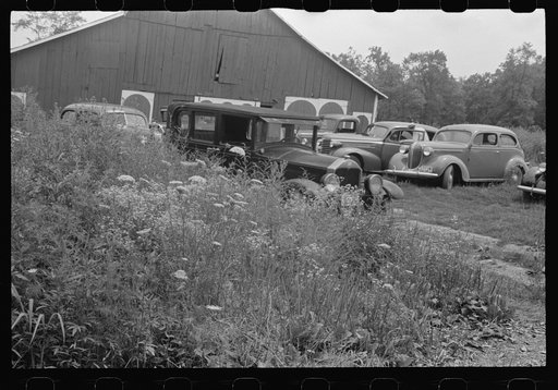 Untitled photo, possibly related to: Autos of spectators attending farmland auction, New Carlisle [i.e. Marysville], Ohio