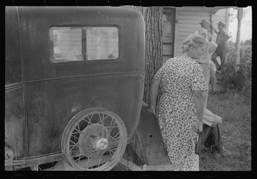 Farmer's wife watching proceedings at farm auction, New Carlisle [i.e. Marysville], Ohio
