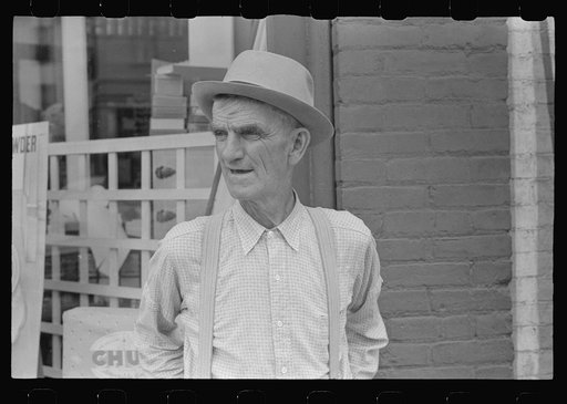 Man on street corner, Marysville, Ohio