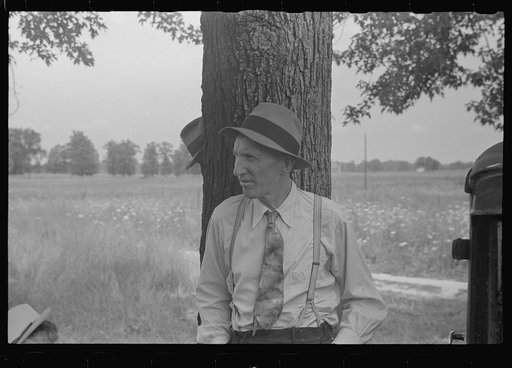 Spectator at farmland auction, New Carlisle [i.e. Marysville], Ohio