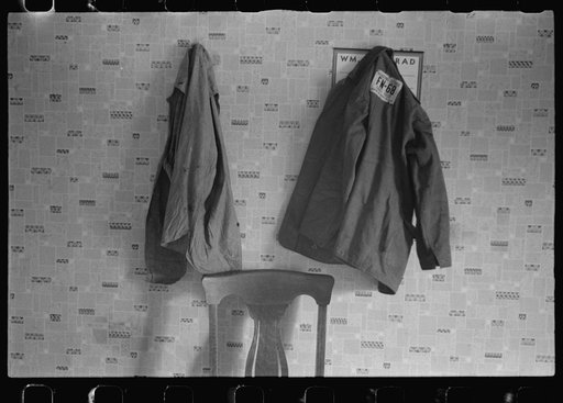 Clothes hanging in house at farmland auction, New Carlisle [i.e. Marysville], Ohio