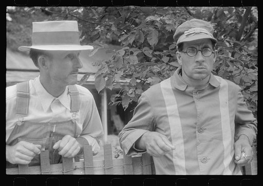 Spectator and clocker at county fair in central Ohio