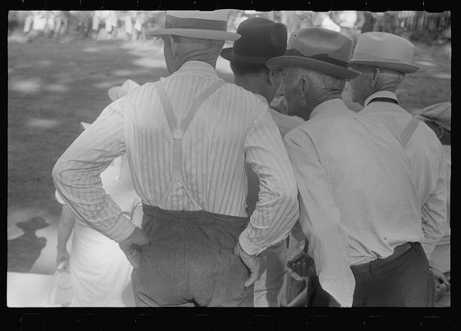 Untitled photo, possibly related to: Spectators at county fair, central Ohio