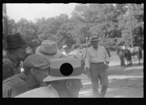 Untitled photo, possibly related to: Spectators at county fair, central Ohio