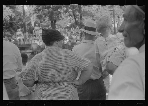Untitled photo, possibly related to: Spectators at county fair, central Ohio
