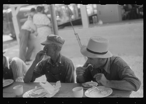 Spectators at county fair eating lunch, central Ohio