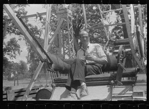 Operator of ferris wheel resting at county fair in central Ohio