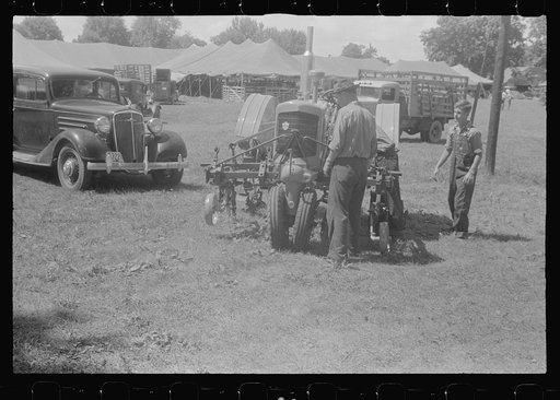 Untitled photo, possibly related to: Tractor on display at county fair, central Ohio
