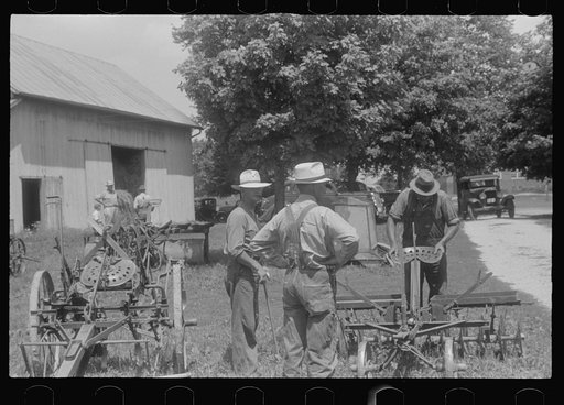 Inspecting farm machinery at public auction, central Ohio