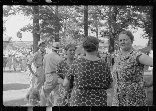 Untitled photo, possibly related to: Spectators at sideshow, county fair, central Ohio