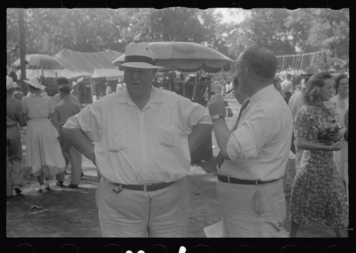 Untitled photo, possibly related to: Spectators at sideshow, county fair, central Ohio