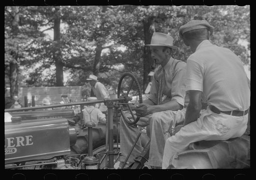 Untitled photo, possibly related to: Farmers talking at county fair, central Ohio