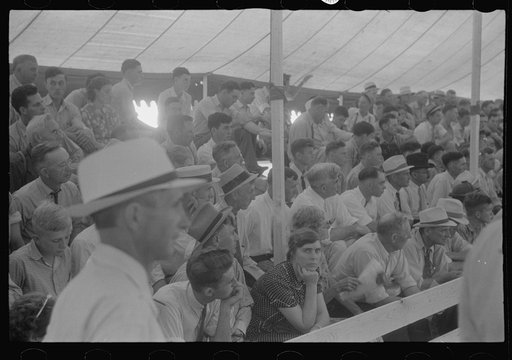 Untitled photo, possibly related to: Spectators at sideshow, county fair, central Ohio