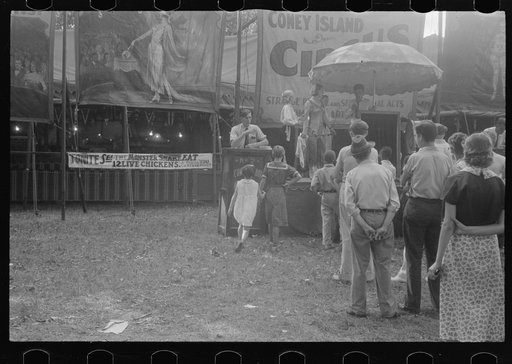 Untitled photo, possibly related to: Selling tickets to the sideshow, county fair, central Ohio