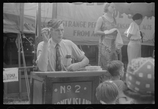 Selling tickets to the sideshow, county fair, central Ohio