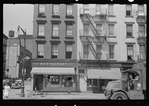 New York, New York. 61st Street between 1st and 3rd Avenues. House fronts