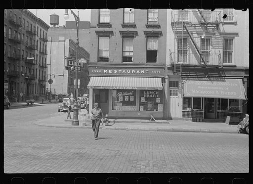 New York, New York. 61st Street between 1st and 3rd Avenues. A street scene