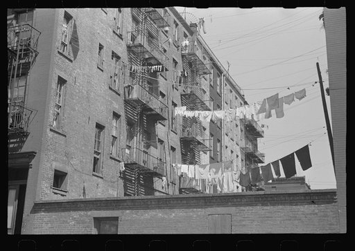 New York, New York. 61st Street between 1st and 3rd Avenues. Apartment houses from the rear