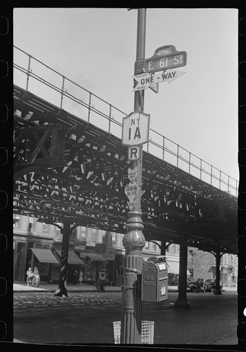 New York, New York. 61st Street between 1st and 3rd Avenues. Street signs