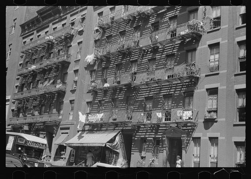 New York, New York. 61st Street between 1st and 3rd Avenues. House fronts